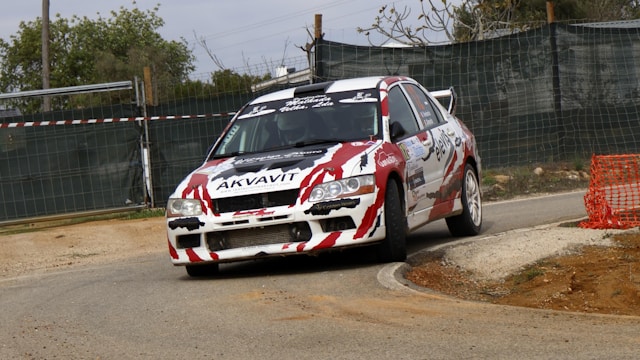 Rally car with exhaust wrap